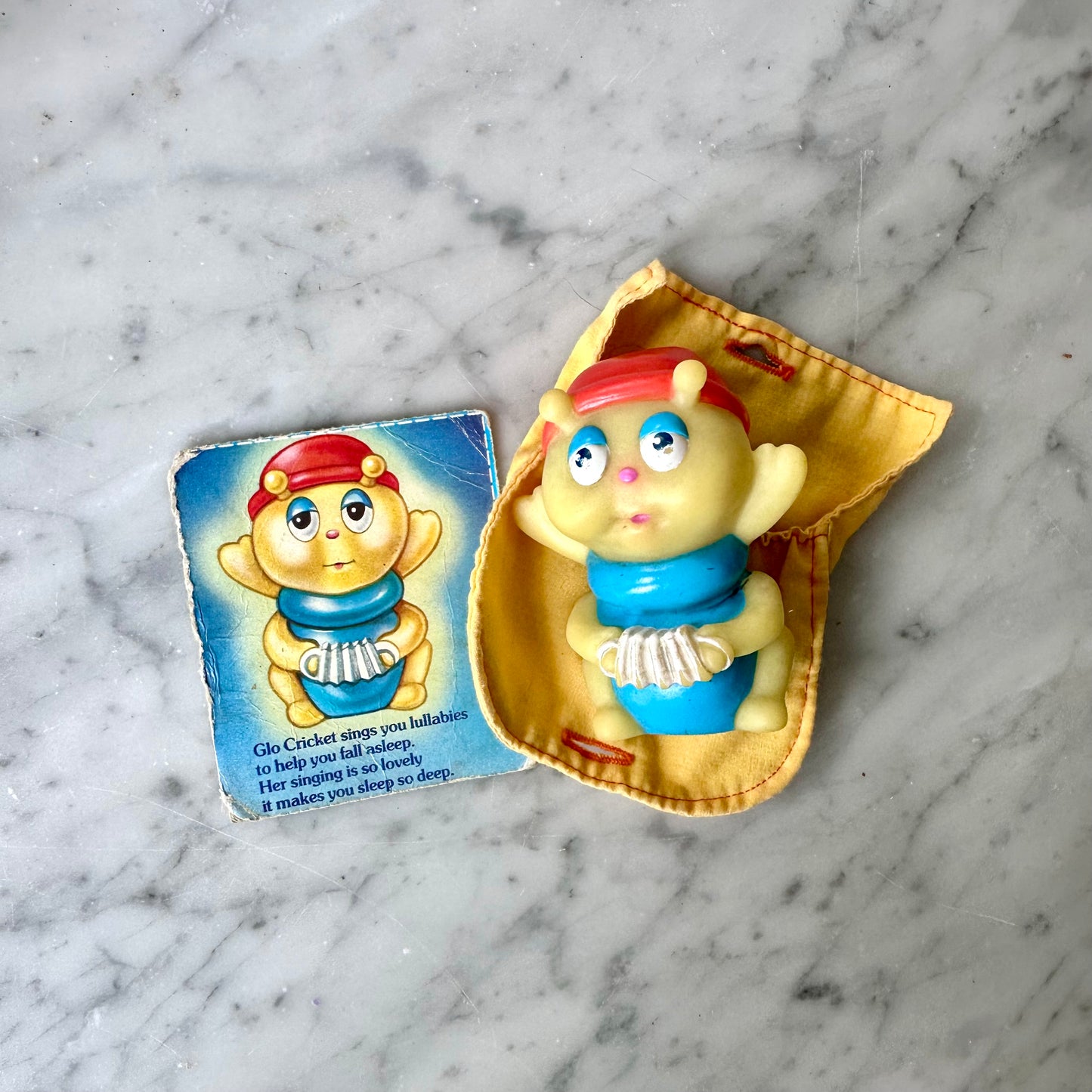 1985 Glo Cricket Figure with Sleeping Bag and Character Card