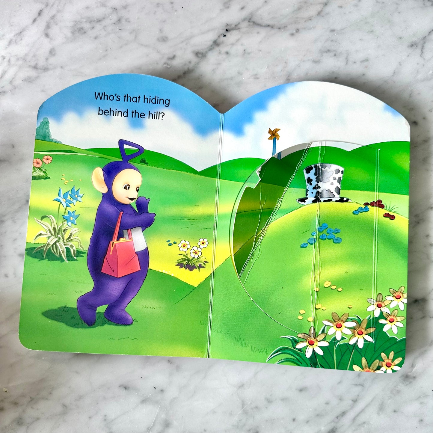 Teletubbies “Play Hide-And-Seek” Lift a Flap Board Book