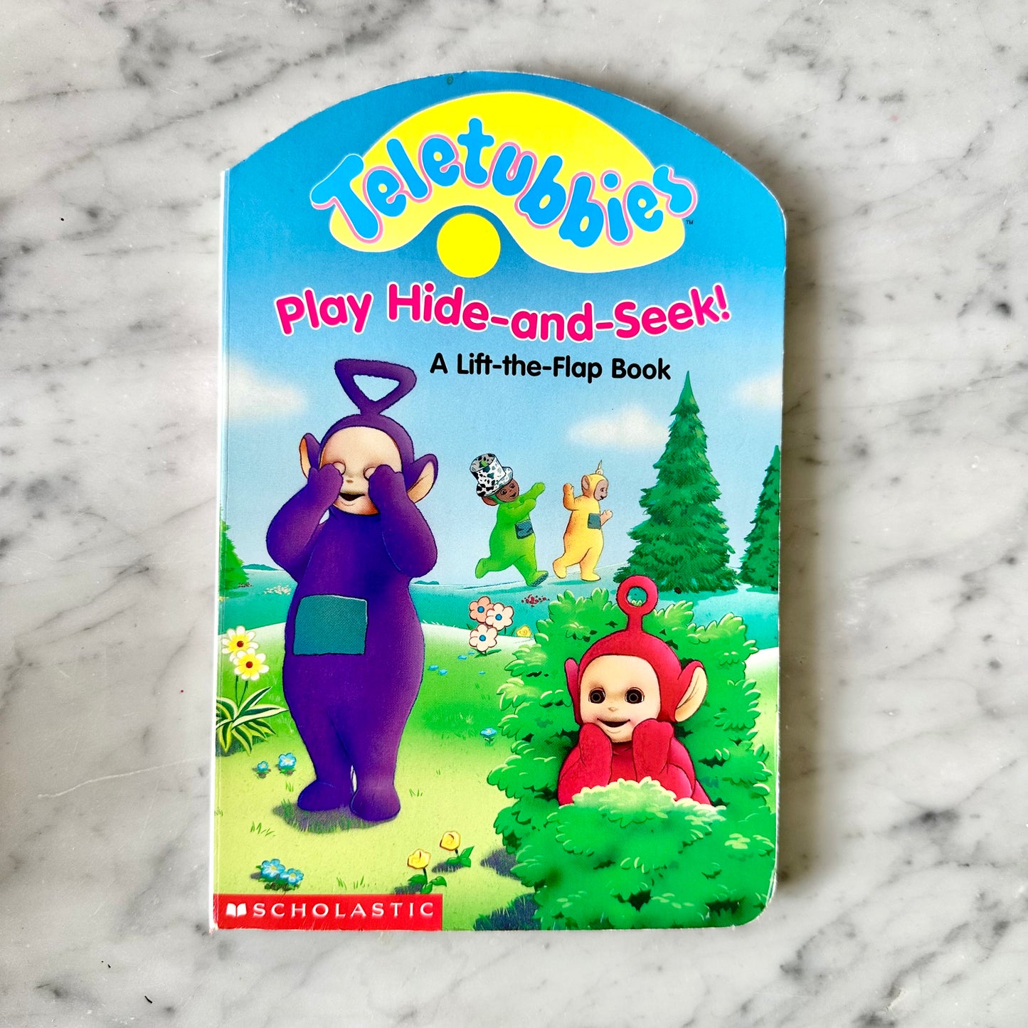 Teletubbies “Play Hide-And-Seek” Lift a Flap Board Book