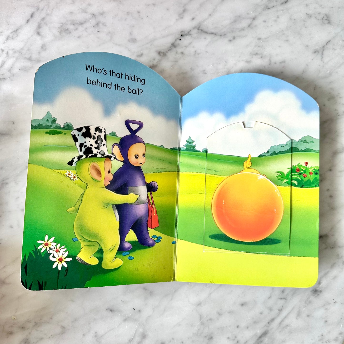 Teletubbies “Play Hide-And-Seek” Lift a Flap Board Book